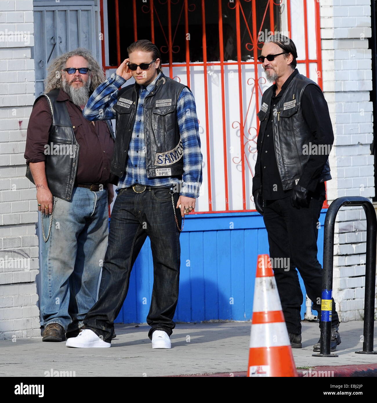 Charlie Hunnam hops on his bike on the set of 'Sons Of Anarchy' after taking time off to film his new movie Crimson Peak in Canada. The uk actor was seen fooling around with the rest of the cast as they film the last season to their hit biker show.  Featu Stock Photo