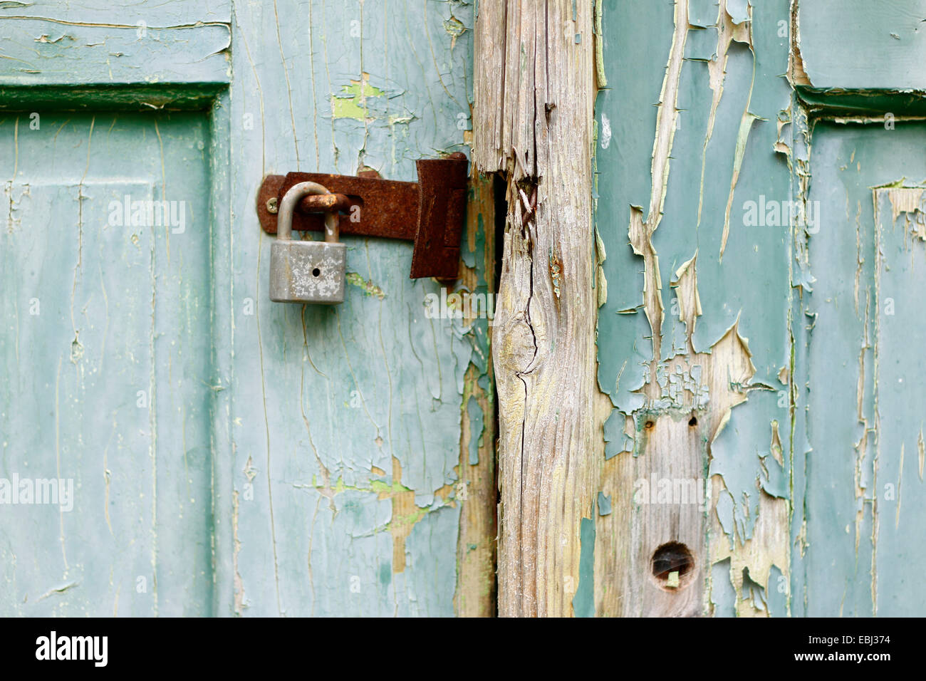 broken lock and door - unlocked Stock Photo