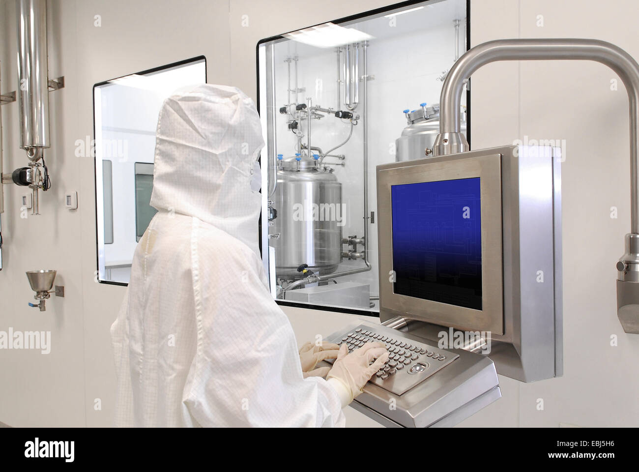 Worker in Clean Room suit at a Pharmaceuticals manufacturing plant