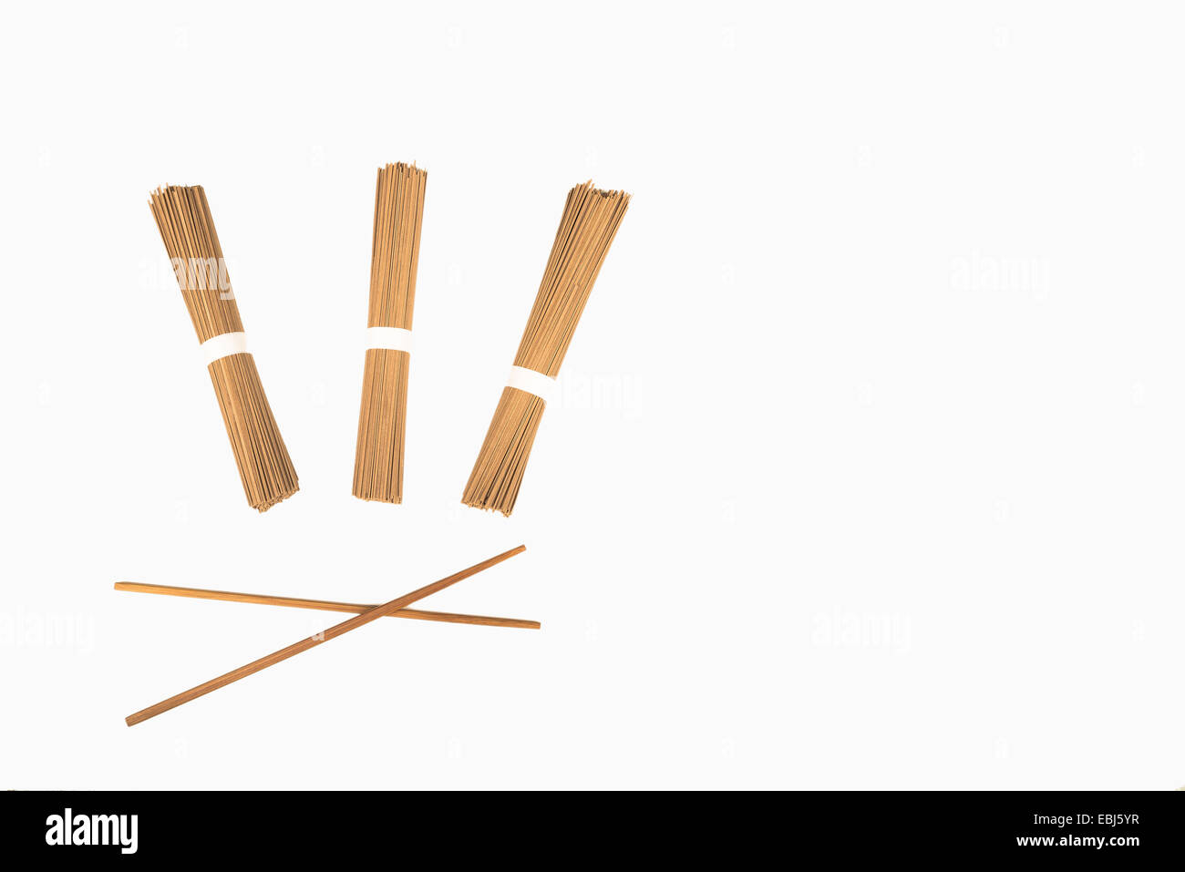 Traditional Japanese soba noodles and chopsticks on white Stock Photo