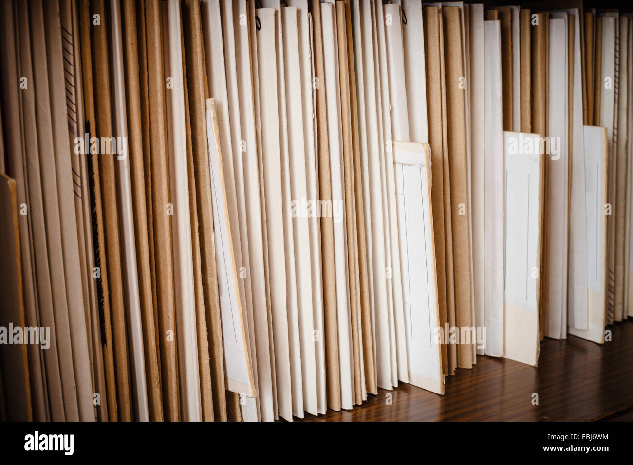 Keeping Records On Yellow Shelves Background Stock Photo