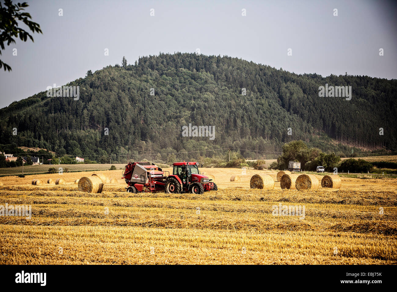 Harvest, harvesting, straw bales, field, tractor Stock Photo - Alamy