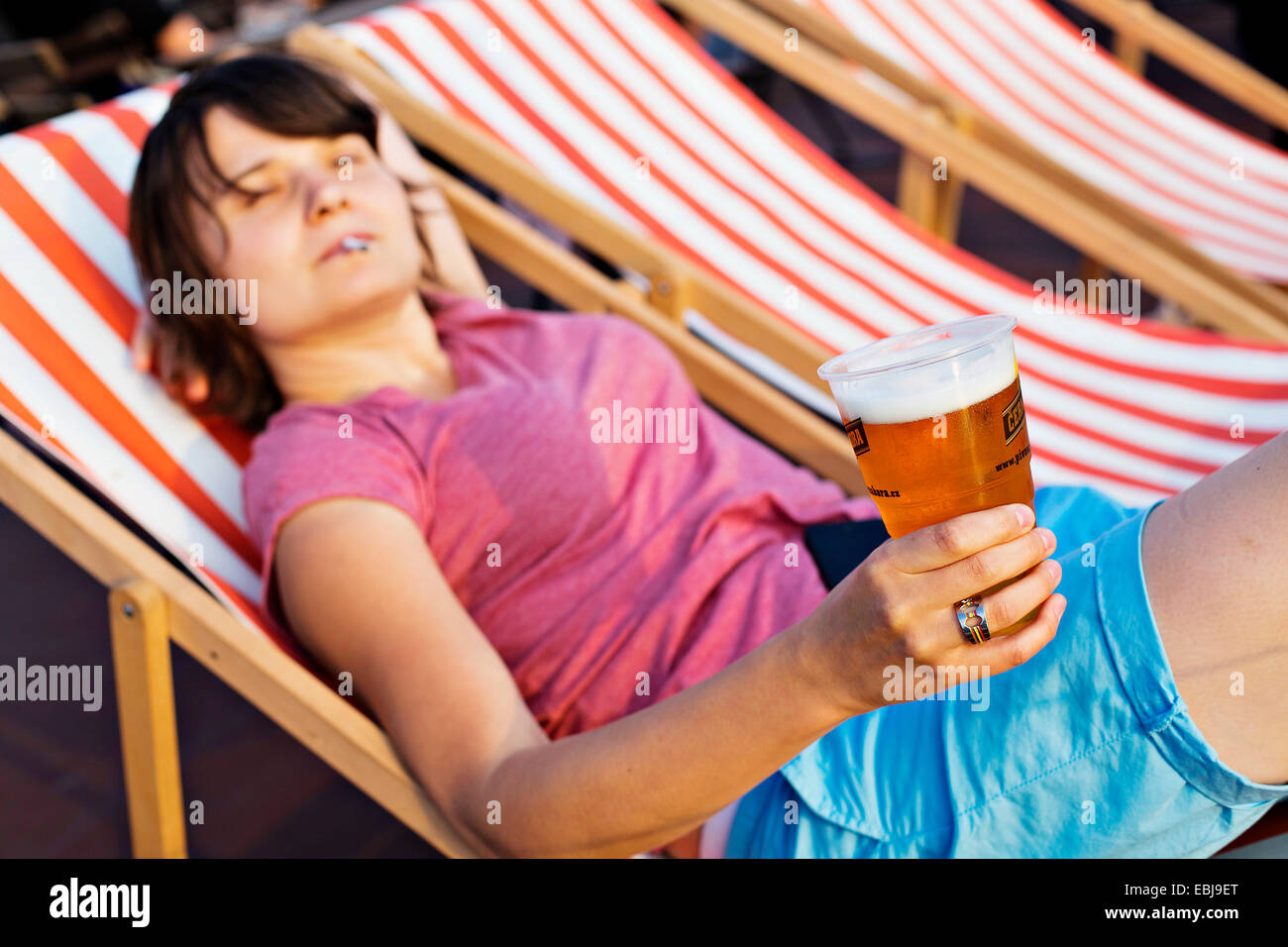young lady, woman, girl, beer, relax, cigarette, smoking, smoke, summer Stock Photo