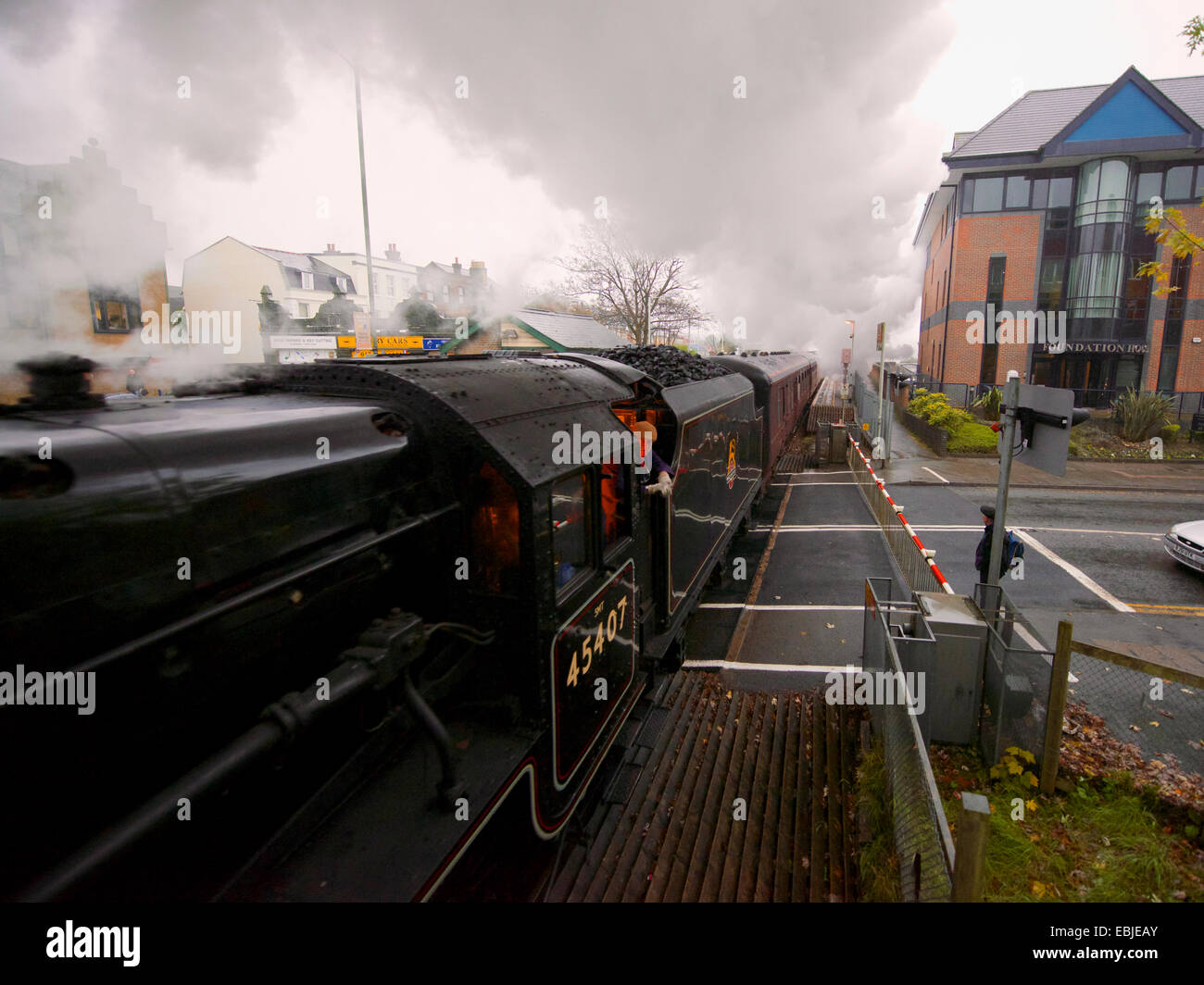 Reigate, Surrey, UK. 2nd December, 2014. 0858 hrs Tuesday 2nd December 2014. The “Cathedrals Express” train, comprising of two of only 18 surviving “Black 5” locomotives: LMT Class 5MT 4-6-0 numbers 44871 Stanier Class “Black Five” and the 45407 Stanier Class “Black Five”, badged “The Lancashire Fusilier” Steam Locomotives together haul passengers at speed through the Surrey Hills at Reigate in Surrey, 0858 hrs Tuesday 2nd December 2014 en route to Bath Spa and Bristol Temple Meads. Credit:  Photo by Lindsay Constable/Alamy Live News Stock Photo