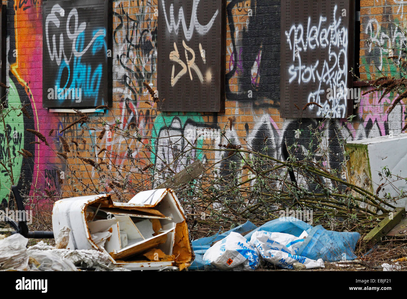 graffitis and illegal garbage dump at an abandonned railway system, Germany, North Rhine-Westphalia, Ruhr Area, Essen Stock Photo