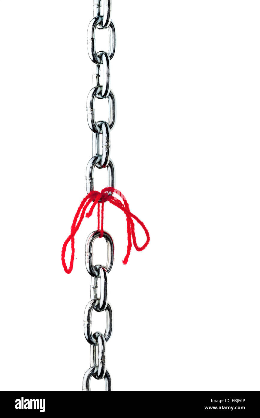 defective steel chain is held together by a thread Stock Photo