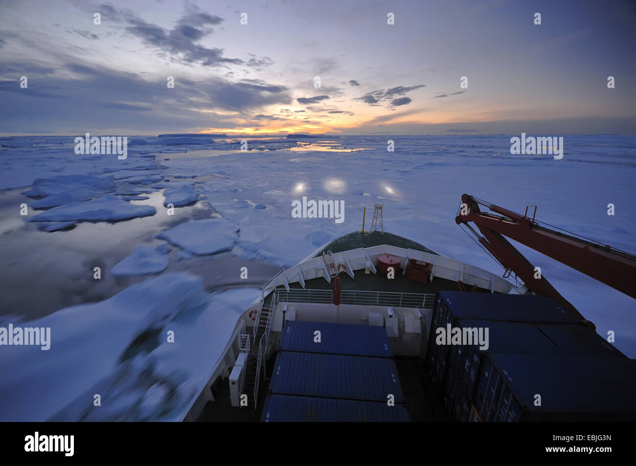 ship breaking a passage through the pack ice near Ross Island, Antarctica Stock Photo