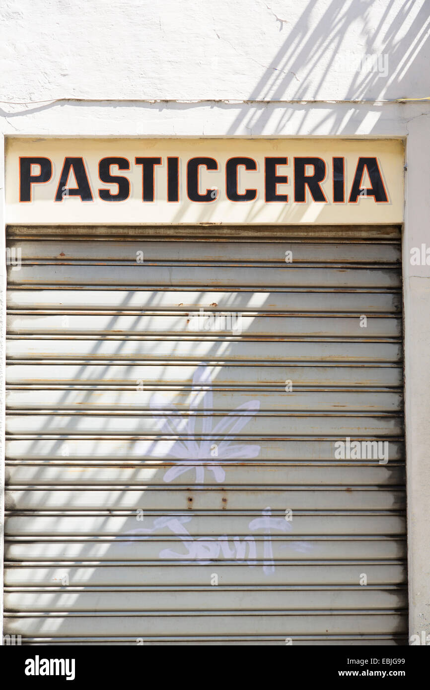 Closed shutters, Pasticceria, Borgomanero, Novara, Italy Stock Photo