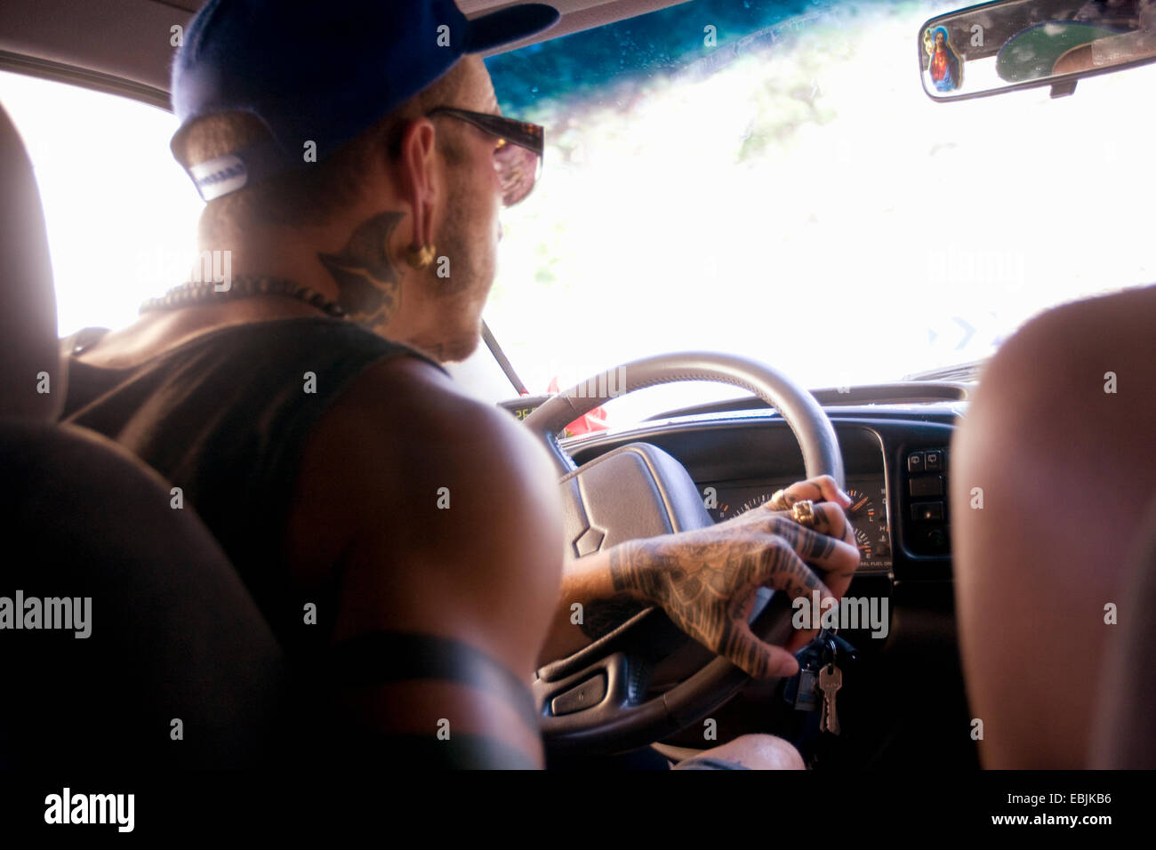 Young man driving car hi-res stock photography and images - Alamy