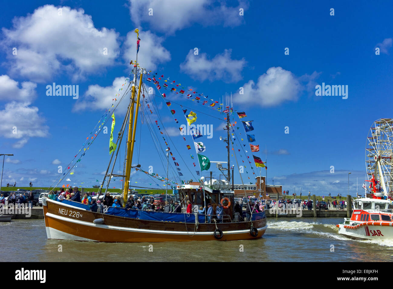 decorated shrimp boat in the harbour, Germany, Lower Saxony, Neuharlingersiel Stock Photo