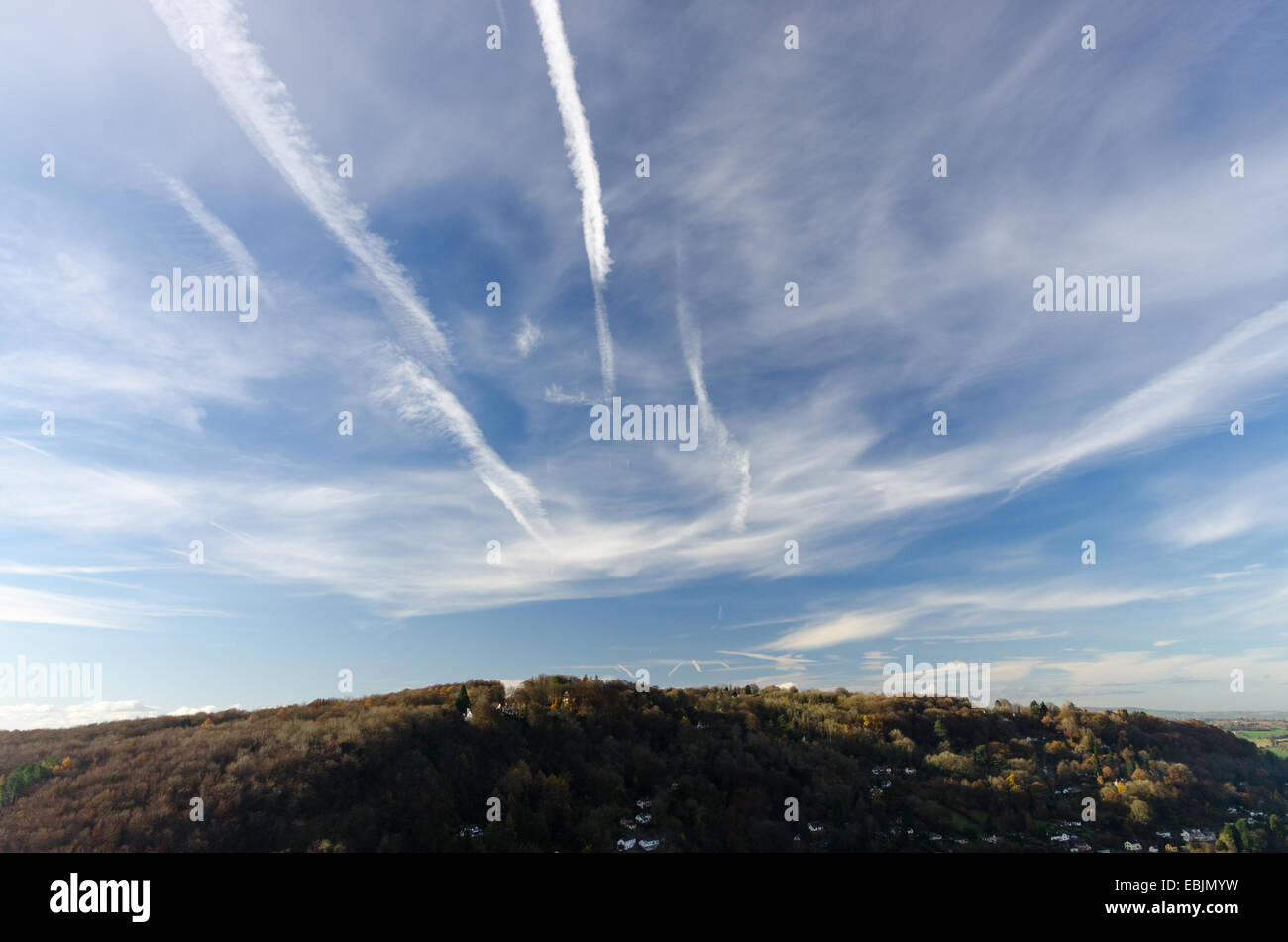 Airplane vapour trails over the Wye Valley in Herefordshire Stock Photo