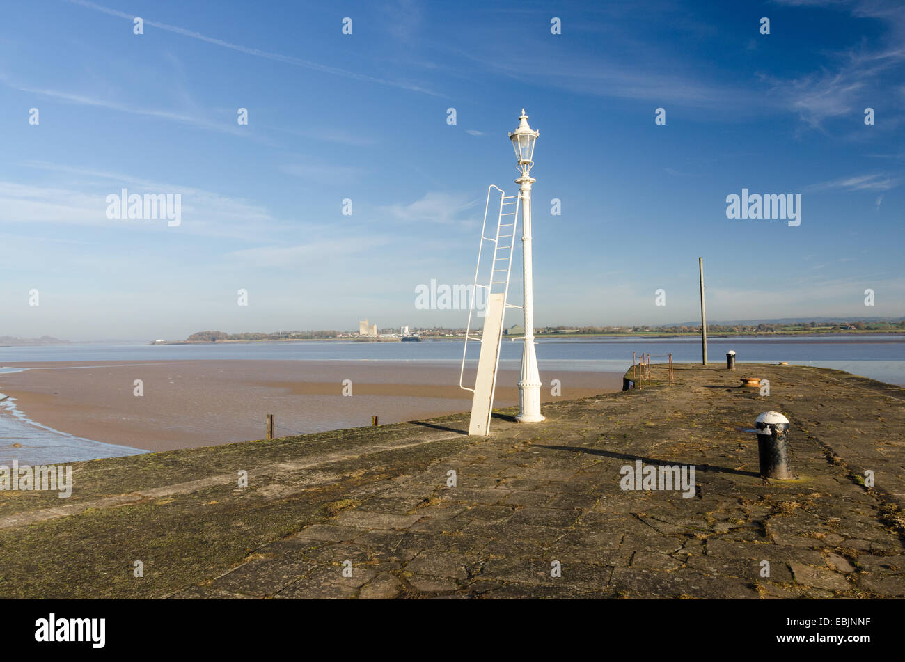 The harbour wall at Lydney Harbour on the West bank of the River Severn in Gloucestershire Stock Photo