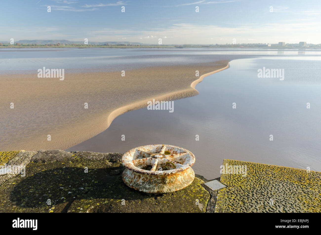 View over the very wide River Severn at low tide from Lydney Harbour on the West bank of the River Severn in Gloucestershire Stock Photo