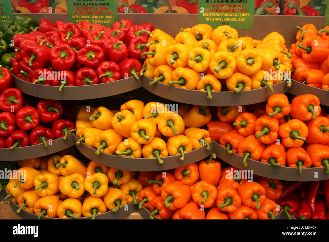 chili pepper, paprika (Capsicum annuum), lots of fruits at the vegetable  section assorted by different colours Stock Photo - Alamy