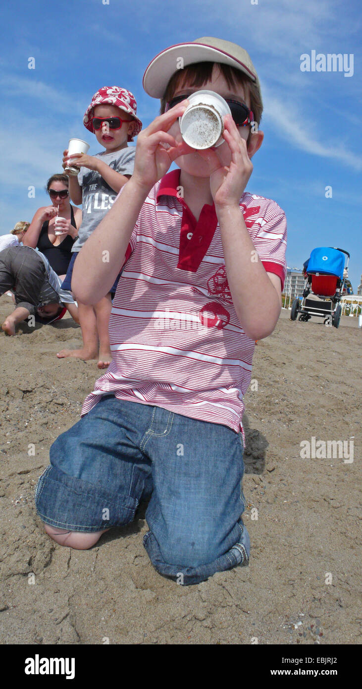 Child Thirsty Beach High Resolution Stock Photography And Images Alamy