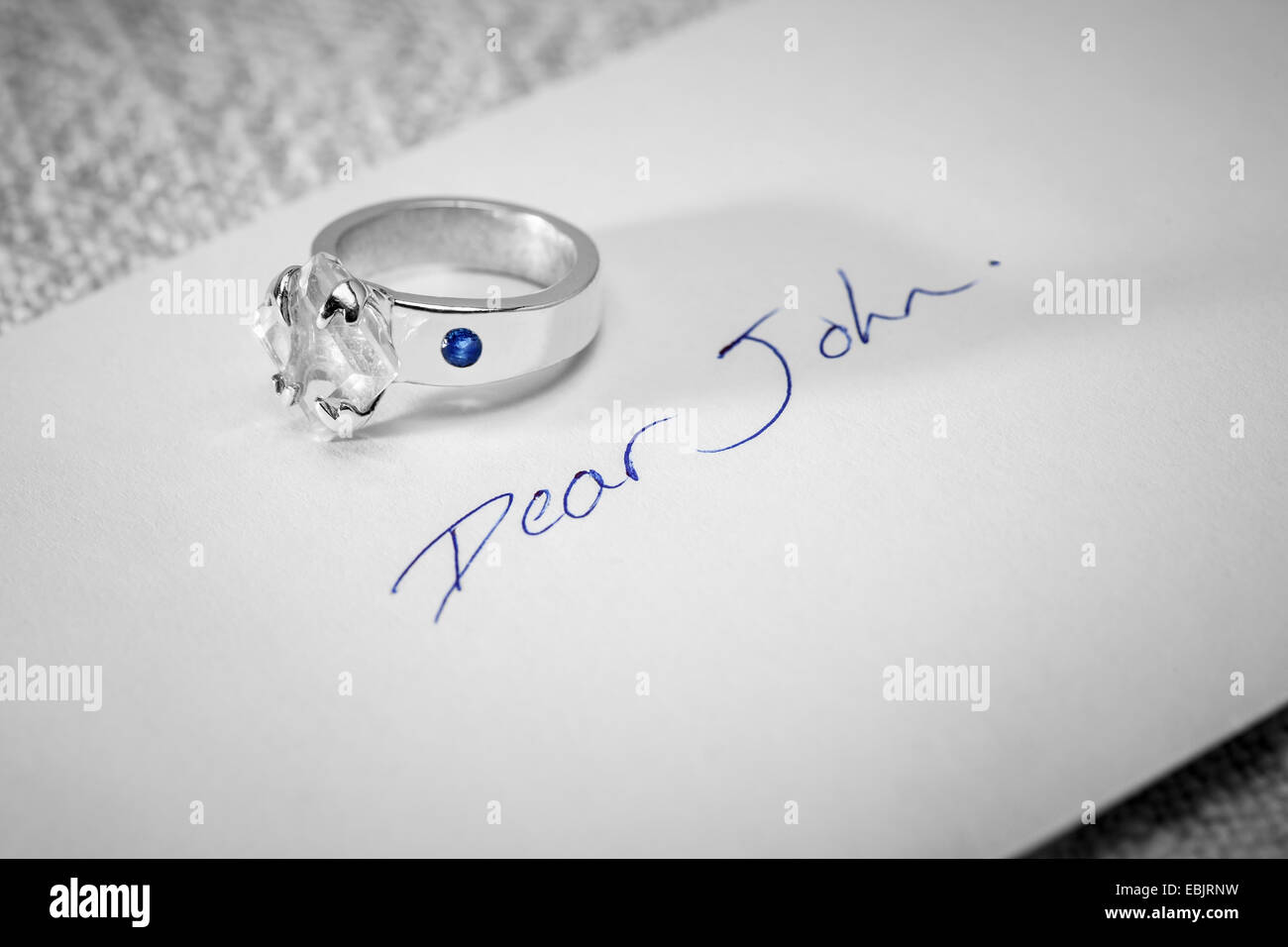 Returned engagement ring on a Dear John letter Stock Photo Alamy