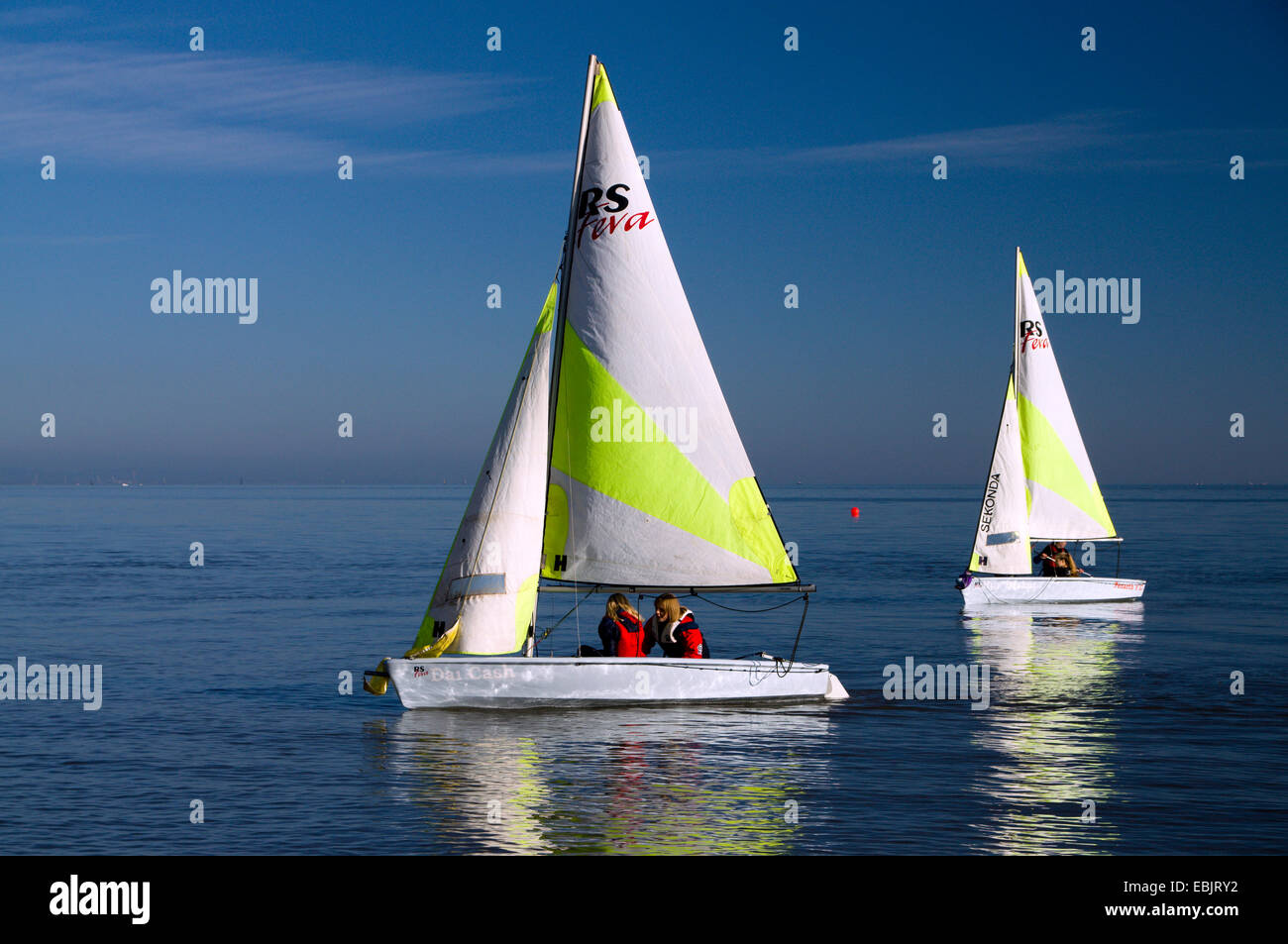 Dingies from Penarth Yacht Club sailing off Penarth, Vale of Glamorgan, South Wales, UK. Stock Photo