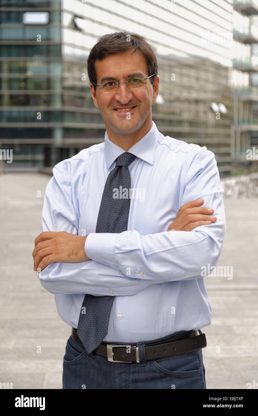 Portrait of man, arms crossed Stock Photo