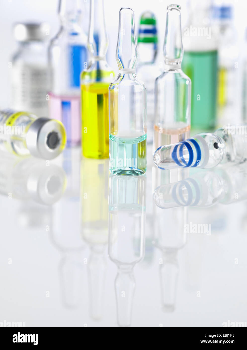 Large group of drugs including vials, ampules and vaccines illustrating medical research Stock