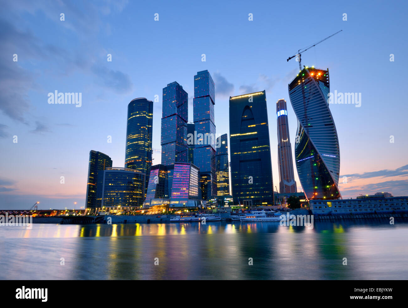 View of skyscrapers on Moskva river at night, Moscow, Russia Stock Photo