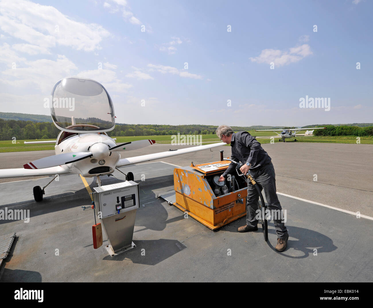 small aircraft D-ESOA Aquila A210 AT01 being fueled by the pilot at the filling station of the airport Hahnweide, Germany, Baden-Wuerttemberg, Kirchheim Unter Teck Stock Photo