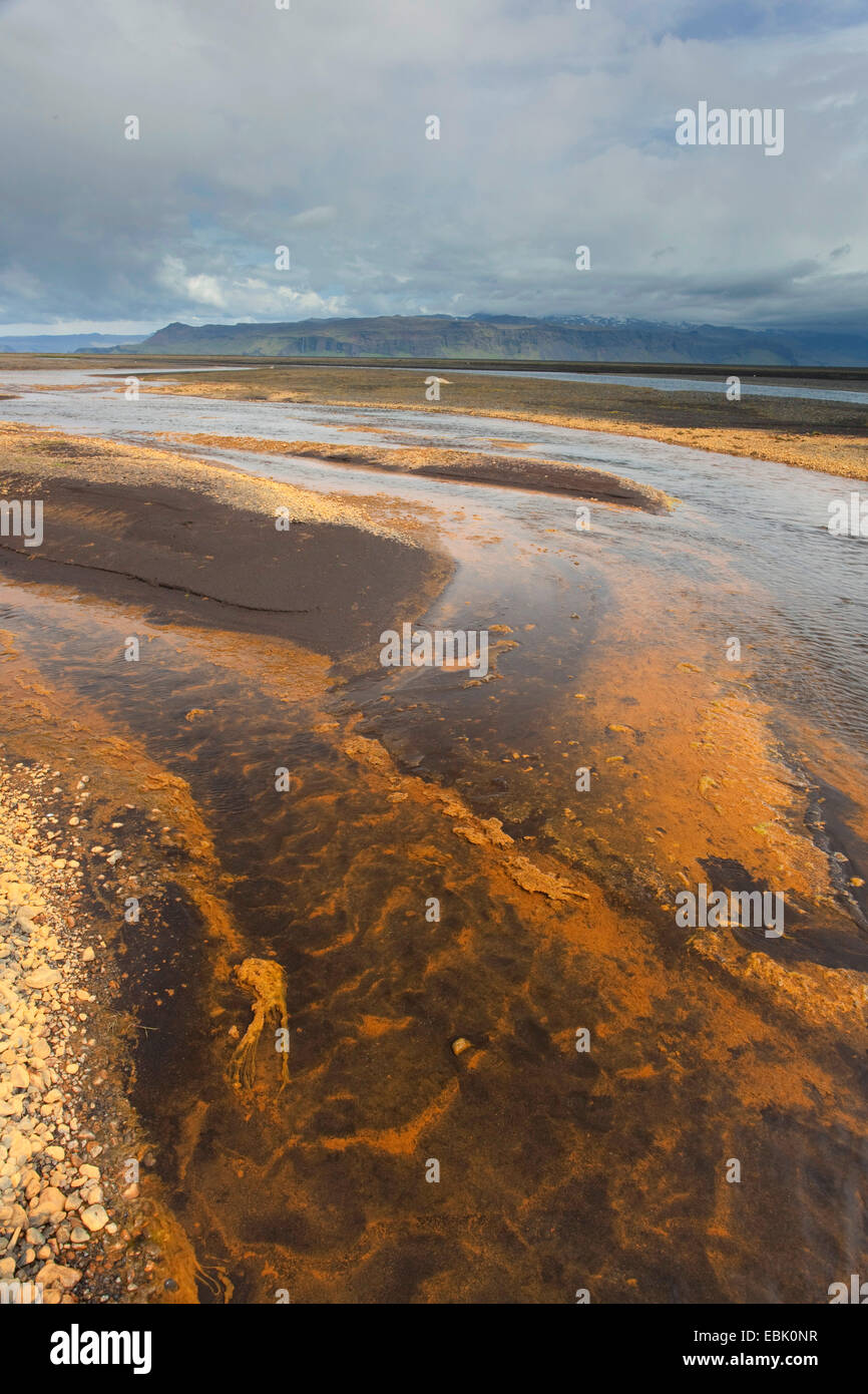 mineral deposits in glacial outflow river, Iceland, Bakki Stock Photo