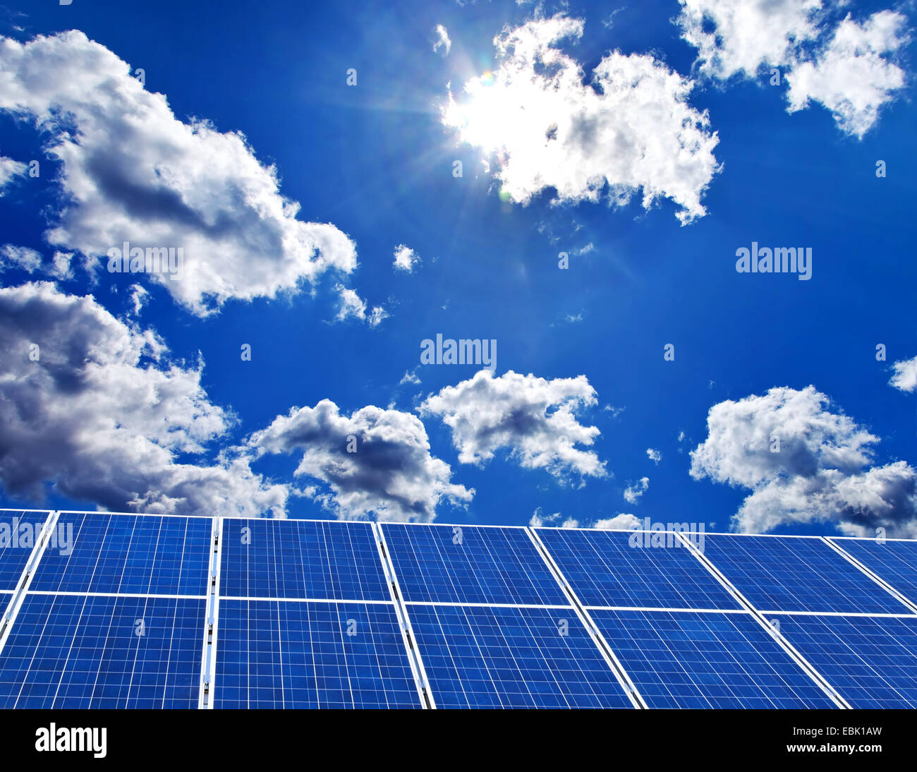 solar plant against blue sky with clouds Stock Photo - Alamy