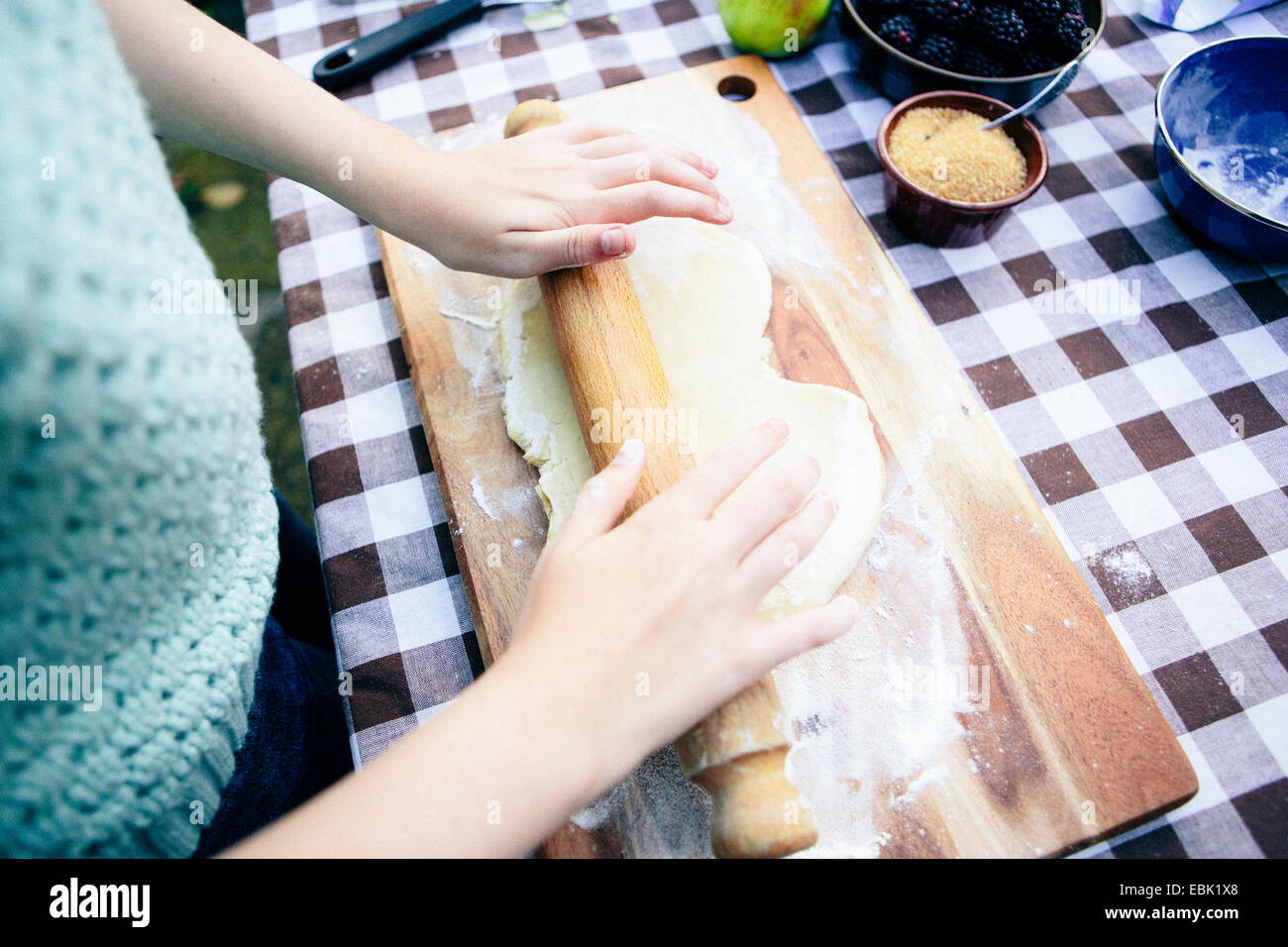 Girl rolling pastry Stock Photo Alamy