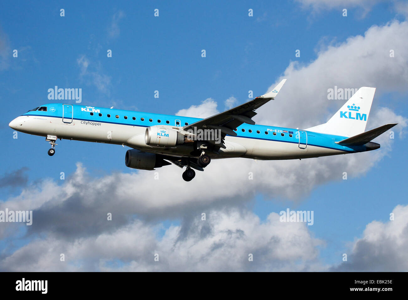 KLM CityHopper Embraer 190 approaches runway 27L at London Heathrow airport. Stock Photo