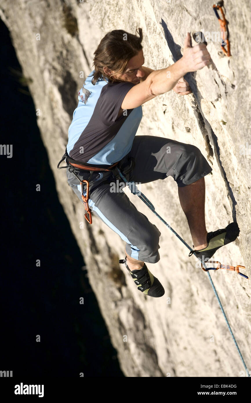 Man climbing on rock hires stock photography and images Alamy