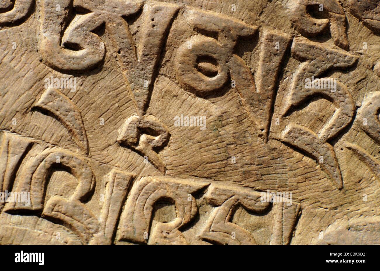 detail of mani stone, mani stones are lettered stone plates in the
