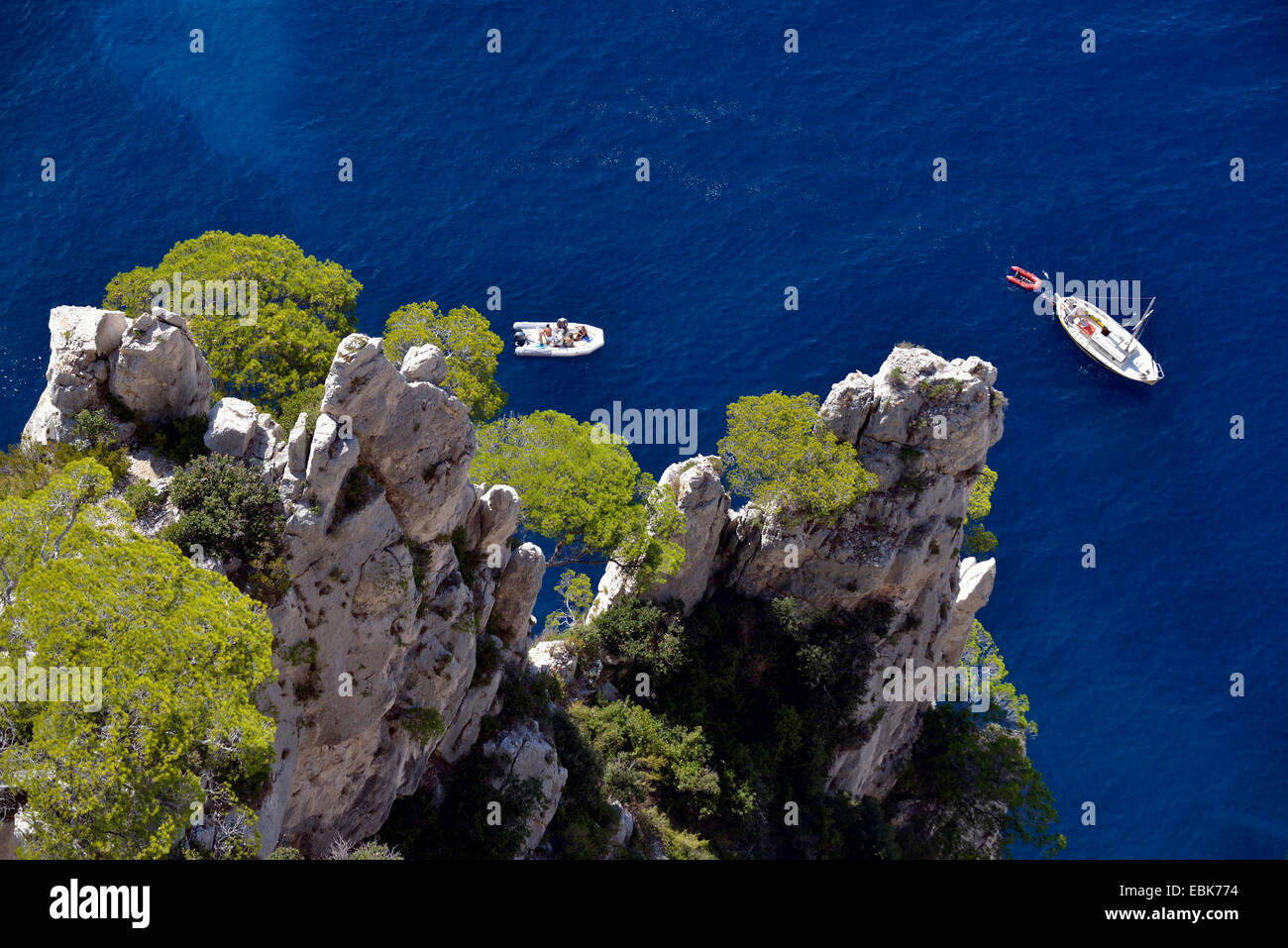 boats at rocky coast Calanque, France, Calanques National Park Stock Photo