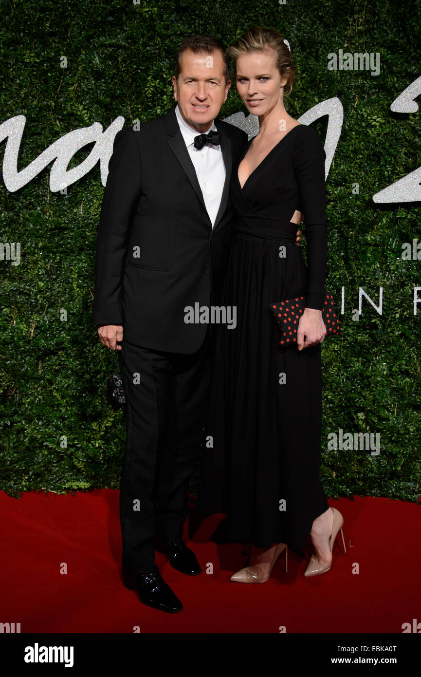 Mario Testino and Eva Herzigova at The British Fashion Awards 2014, in London. Stock Photo