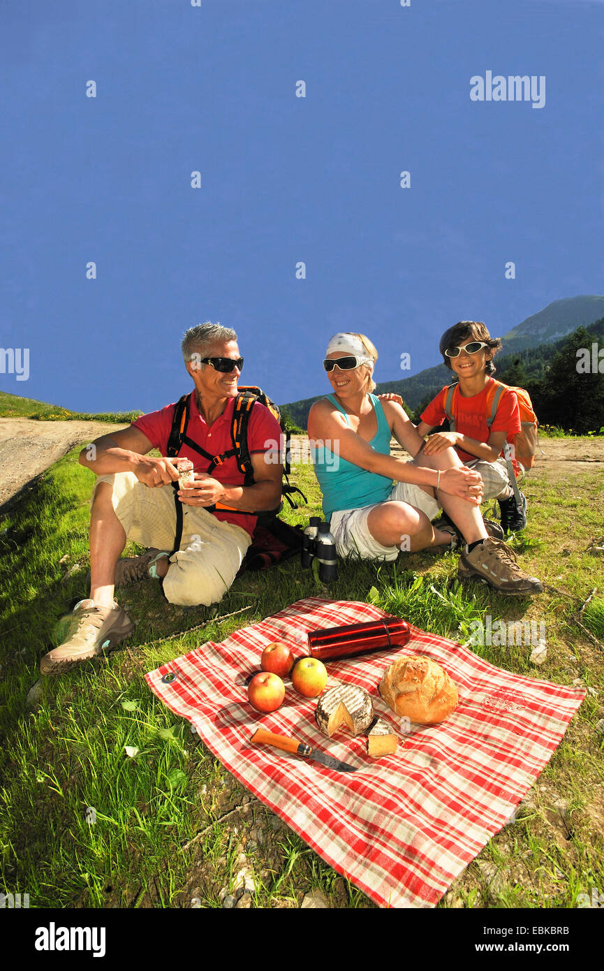 family having a picnic, France, Savoie Stock Photo