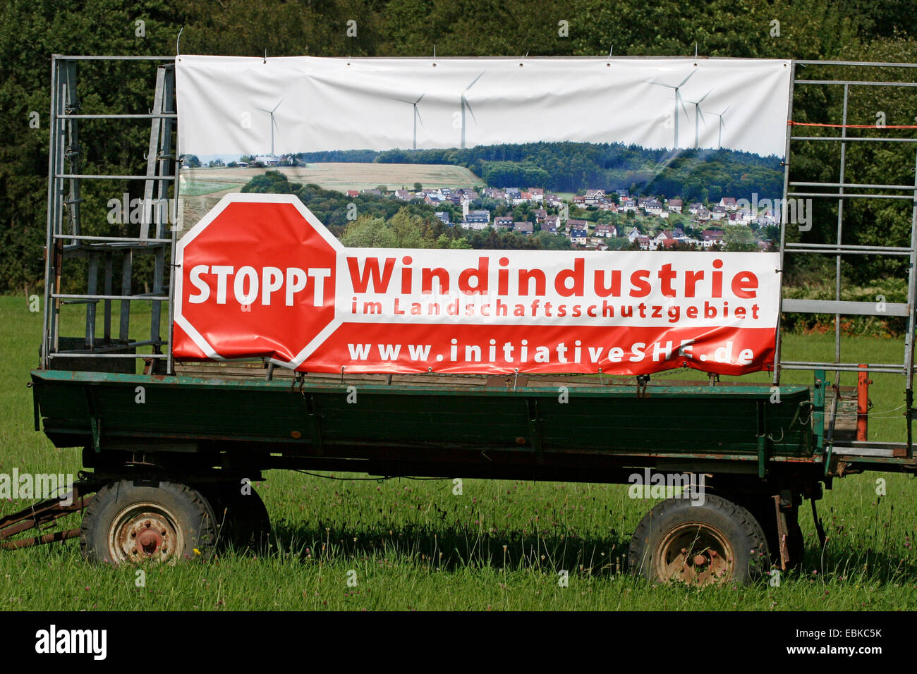trailer with banner against wind power stations, Germany Stock Photo