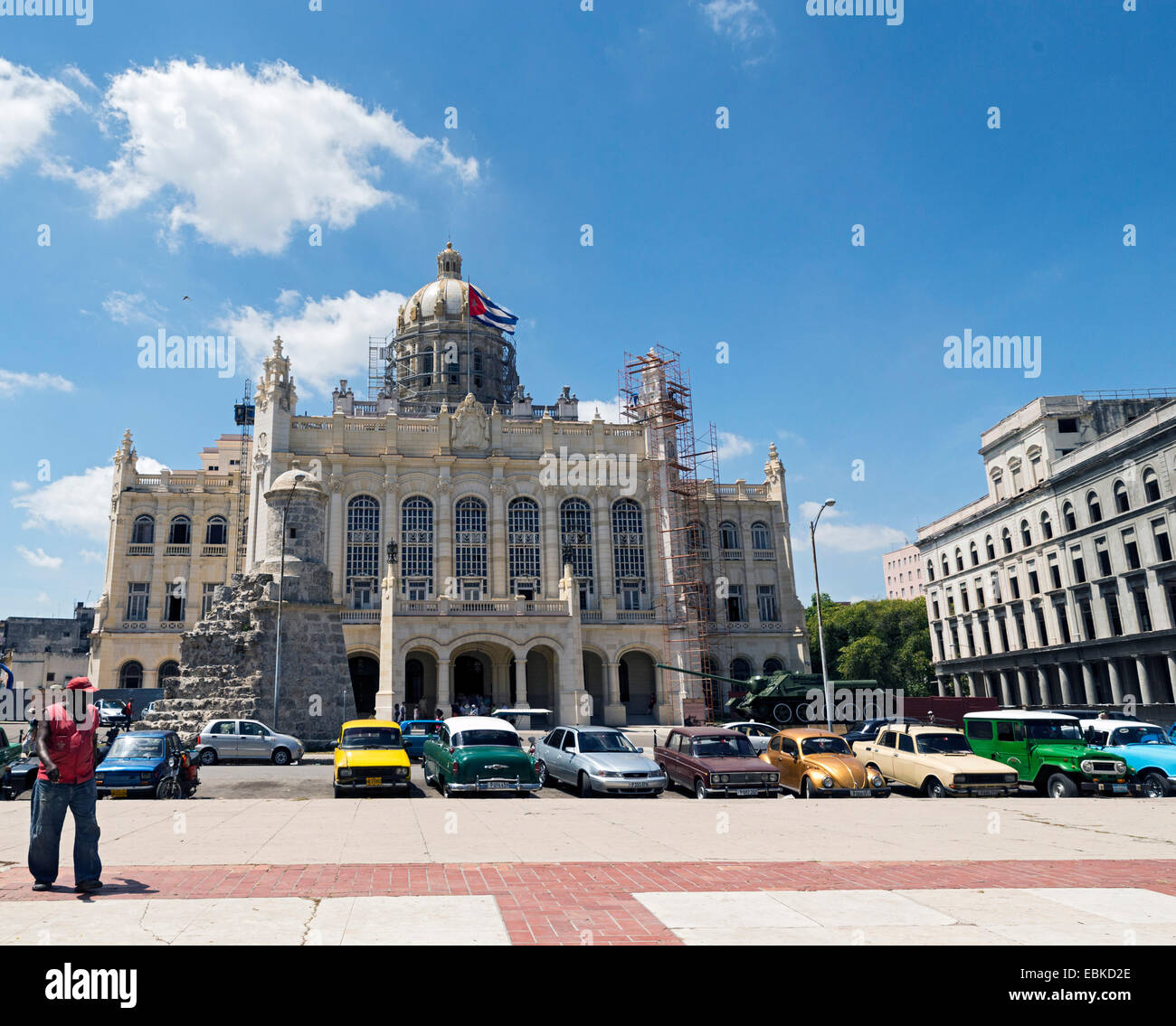 HAVANA - MAY 5: A parking attendant in front of the Museum of the Revolution on May 5, 2014 in Havana, Cuba Stock Photo