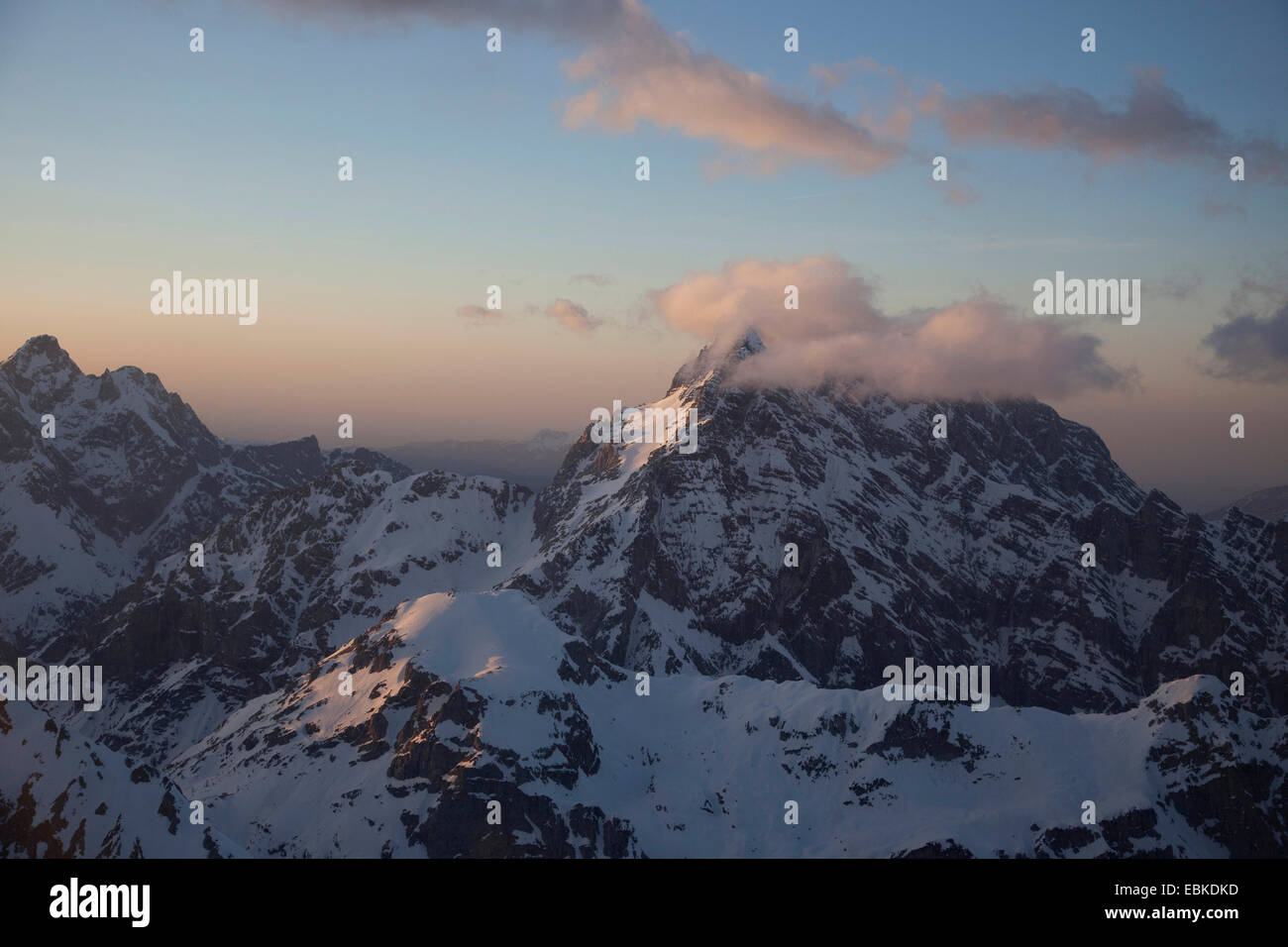 summit of Watzmann in clouds at sun set, Germany, Bavaria, Koenigssee, Berchtesgaden Stock Photo