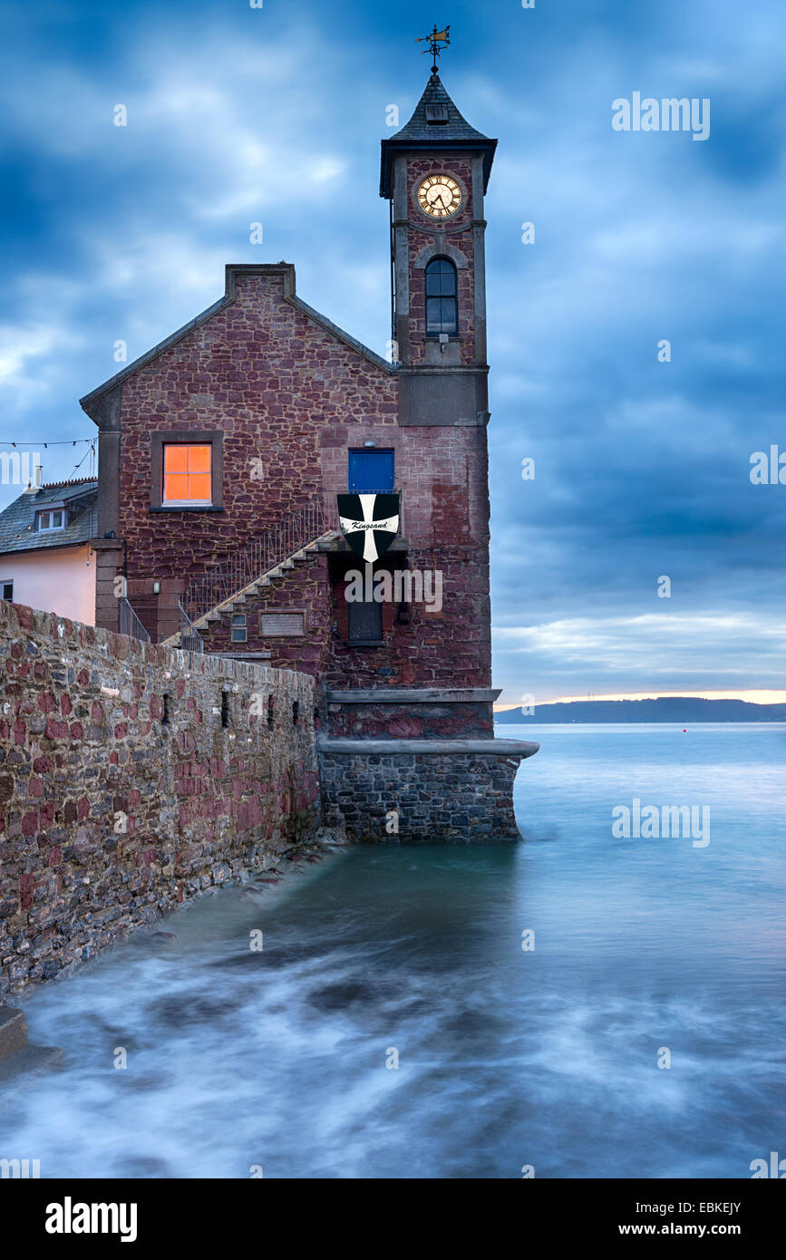 High tide a the old clock tower at Kingsand on the Cornwall coast Stock