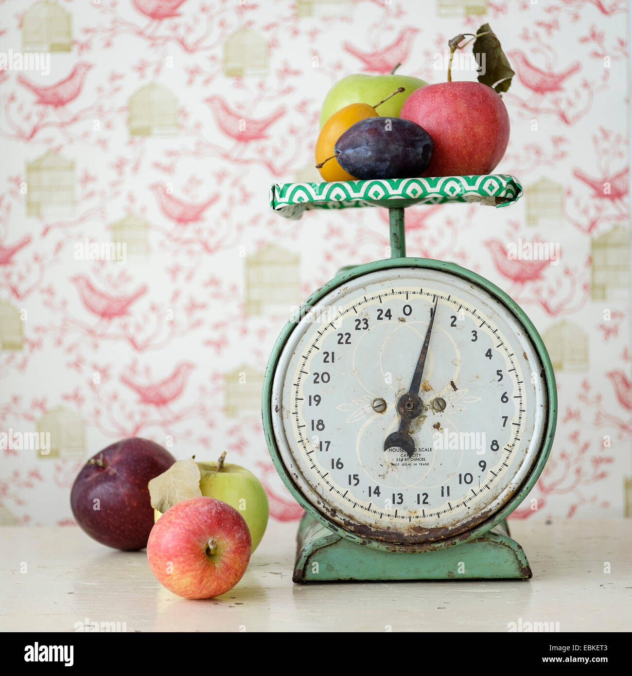 Studio shot of fruits on weight scale Stock Photo