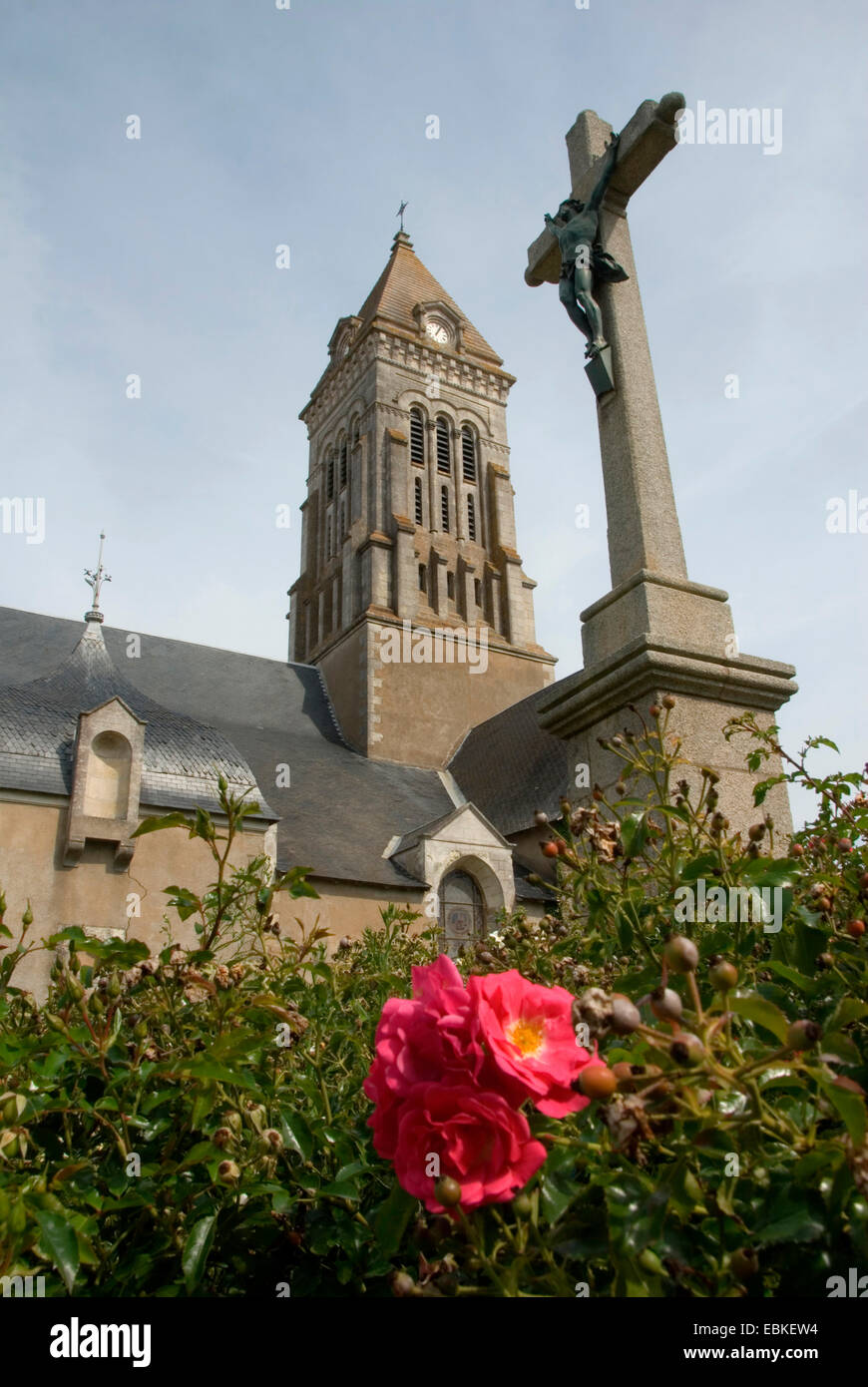 church Saint Philibert on the le de Noirmoutier with blooming rose