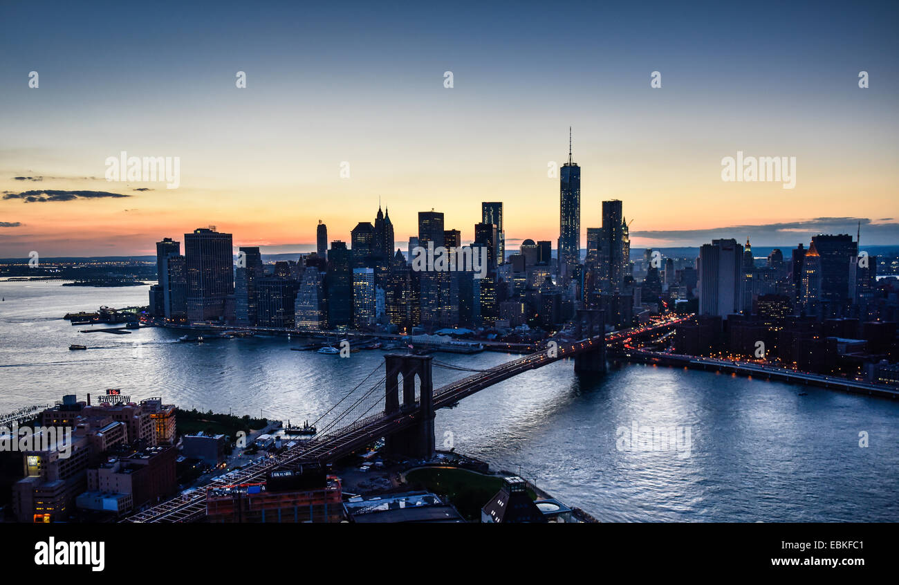 USA, New York State, New York City, Aerial view of downtown at dusk Stock Photo