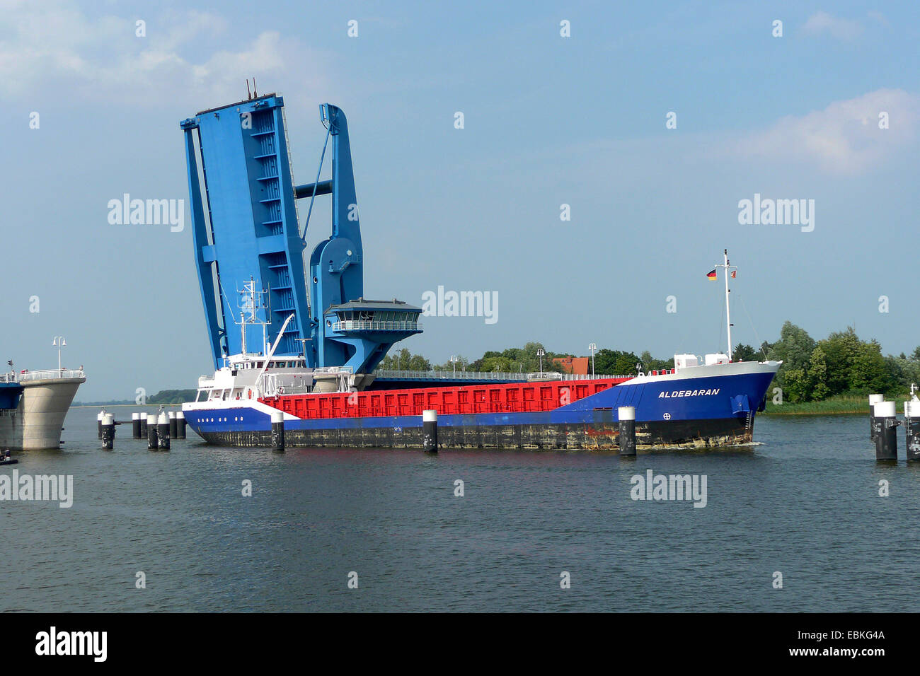bascule bridge of Wolgast and cargo ship, Germany, Mecklenburg-Western Pomerania, Peenestrom, Wolgast Stock Photo