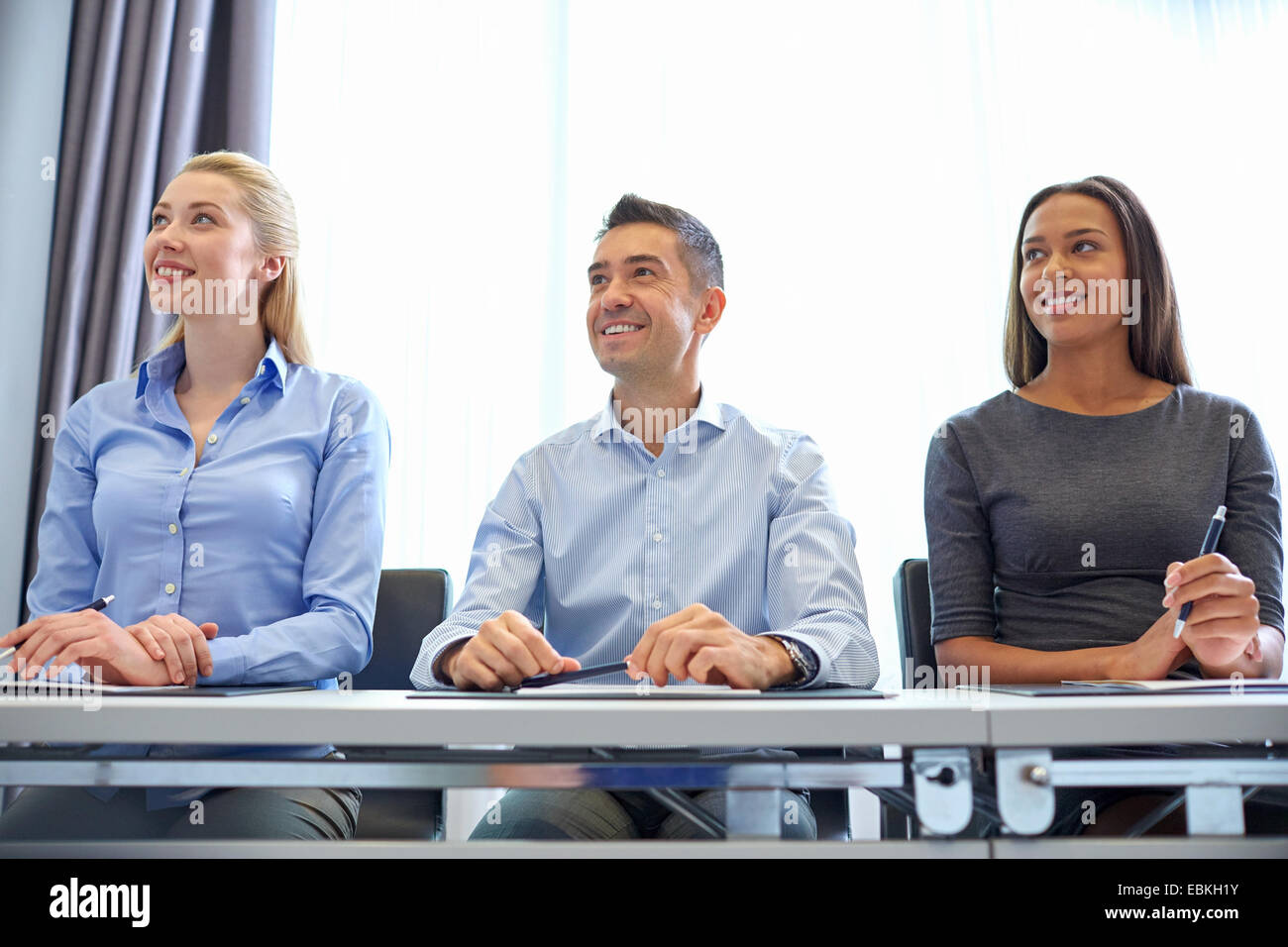 smiling business people meeting in office Stock Photo - Alamy
