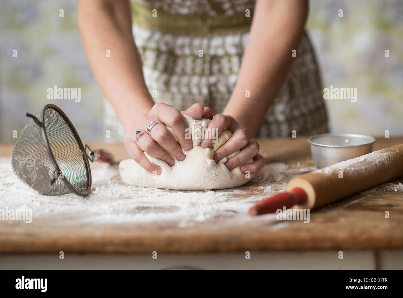 Woman kneading dough Stock Photo Alamy