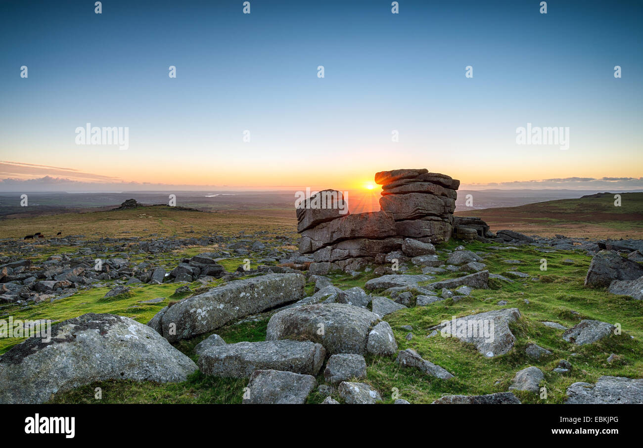 Sunset at Staple Tor a weathered granite rock formation on Dartmoor National Park in Devon Stock Photo