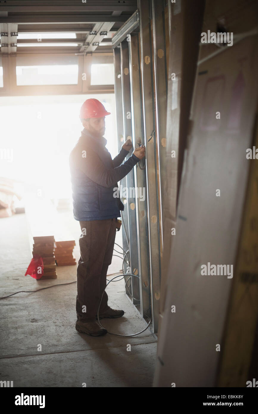 Man working at construction site Stock Photo