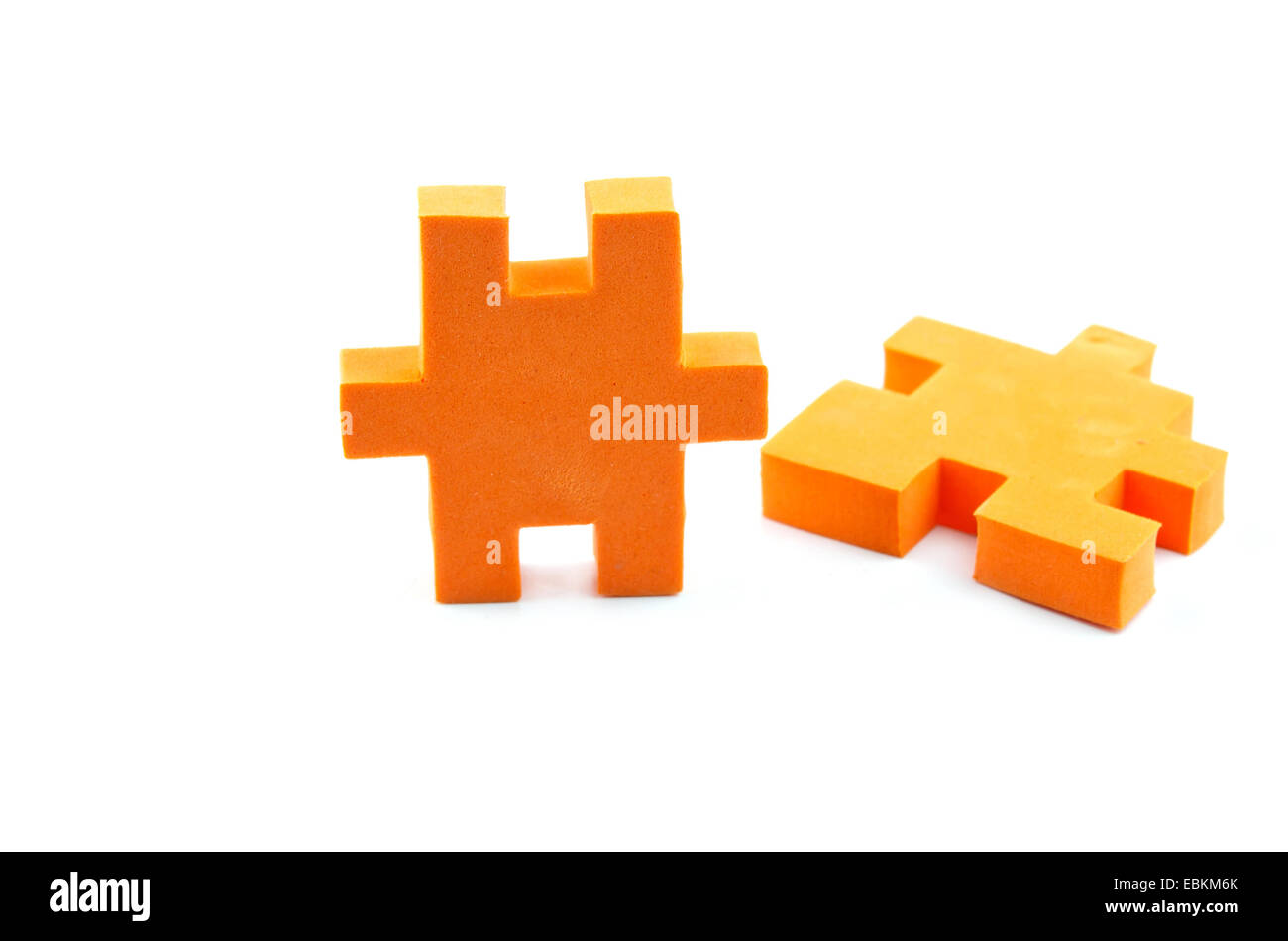 orange jigsaw puzzle pieces Stock Photo Alamy