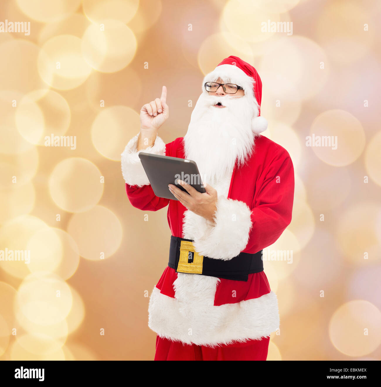 man in costume of santa claus with tablet pc Stock Photo - Alamy