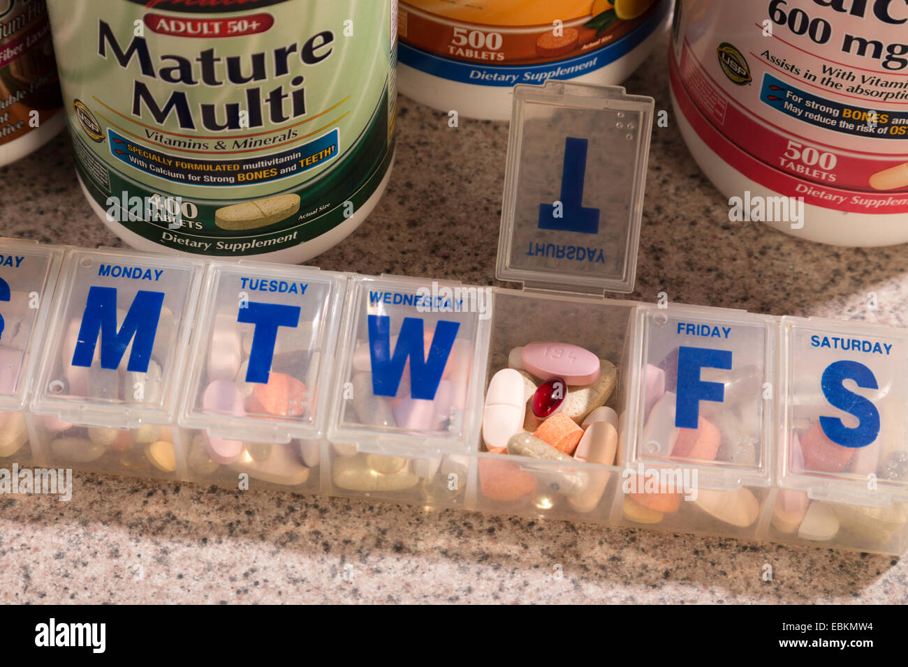 Vitamin Bottles and Pill Container, USA Stock Photo