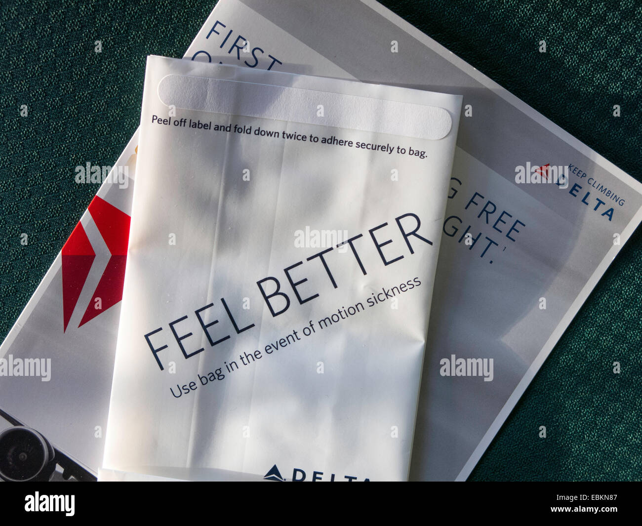 Delta Airlines Inflight Air Sickness Bag and Brochure on Airplane , USA Stock Photo